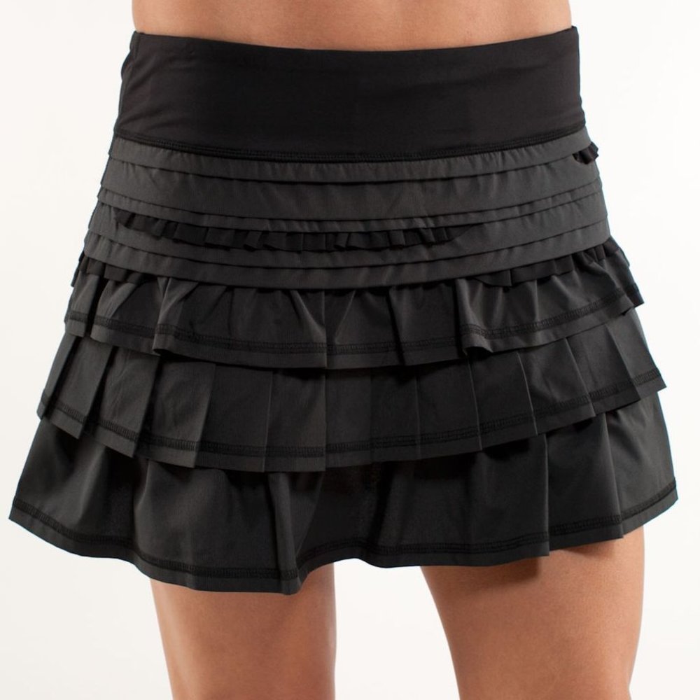 ISO: RUN BACK ON TRACK SKIRT SZ 2 IN BLACK